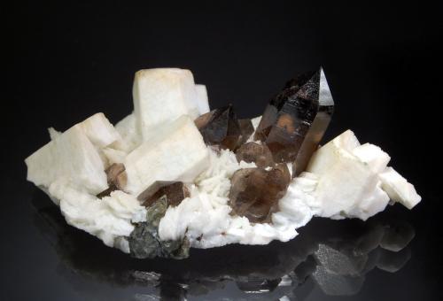 Quartz (variety smoky) and Microcline<br />Government Pit, Albany, Carroll County, New Hampshire, USA<br />2.7 x 4.6 x 7.8 cm<br /> (Author: crosstimber)