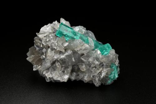 Beryl (variety emerald), Calcite, Dolomite<br />La Pita mining district, Cunas Mine, Municipio Maripí, Western Emerald Belt, Boyacá Department, Colombia<br />53x35x25mm, main xl=31x7mm<br /> (Author: Fiebre Verde)