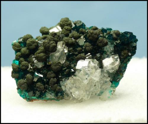 Calcite, Mottramite, Dioptase<br />Tsumeb Mine, Tsumeb, Otjikoto Region, Namibia<br />30 x 22 x 10 mm<br /> (Author: Pierre Joubert)