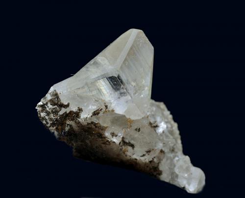 Calcita<br />Zona minera de La Florida, Herrería-Valdáliga-Rionansa, Comarca Costa Occidental/Saja-Nansa, Cantabria, España<br />Dos cristales maclados de 10x10x5mm<br /> (Autor: Antonio Carmona)