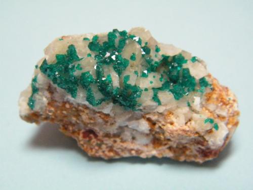 Dioptase on Calcite<br />Tsumeb Mine, Tsumeb, Otjikoto Region, Namibia<br />40mm x 26mm x 23mm<br /> (Author: Heimo Hellwig)