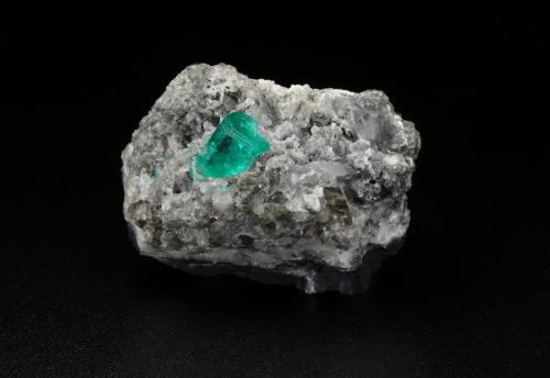 Beryl (variety emerald), Calcite<br />Muzo mining district, Western Emerald Belt, Boyacá Department, Colombia<br />37x19x24mm, xl=9x6mm<br /> (Author: Fiebre Verde)