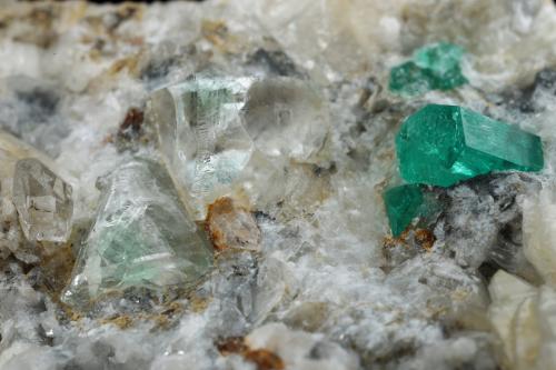 Beryl (variety emerald), Calcite, Quartz, Fluorite<br />Mina Peñas Blancas, Municipio San Pablo de Borbur, Cinturón Esmeraldífero Occidental, Departamento Boyacá, Colombia<br />100x61x65mm, main xls=7 & 7mm<br /> (Author: Fiebre Verde)
