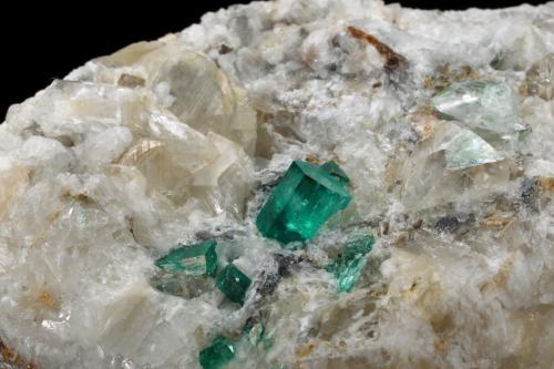 Beryl (variety emerald), Calcite, Quartz, Fluorite<br />Mina Peñas Blancas, Municipio San Pablo de Borbur, Cinturón Esmeraldífero Occidental, Departamento Boyacá, Colombia<br />100x61x65mm, main xls=7 & 7mm<br /> (Author: Fiebre Verde)