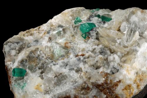 Beryl (variety emerald), Calcite, Quartz, Fluorite<br />Mina Peñas Blancas, Municipio San Pablo de Borbur, Cinturón Esmeraldífero Occidental, Departamento Boyacá, Colombia<br />100x61x65mm, main xls=7 & 7mm<br /> (Author: Fiebre Verde)