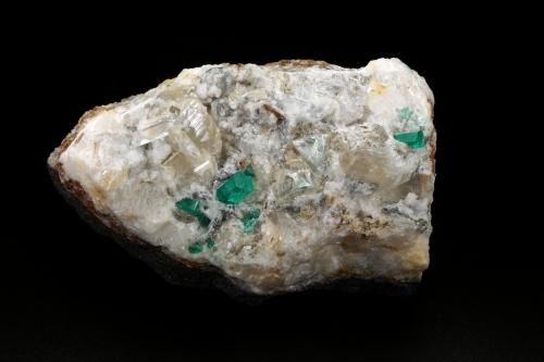 Beryl (variety emerald), Calcite, Quartz, Fluorite<br />Mina Peñas Blancas, Municipio San Pablo de Borbur, Cinturón Esmeraldífero Occidental, Departamento Boyacá, Colombia<br />100x61x65mm, main xls=7 & 7mm<br /> (Author: Fiebre Verde)