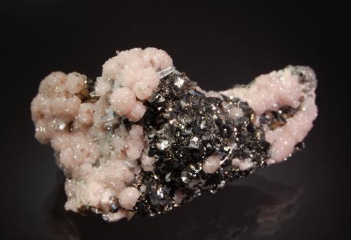 Rhodochrosite<br />Trepča Complex, Trepča Valley, Kosovska Mitrovica, Kosovska Mitrovica District, Kosovo<br />4.7 x 7.8 cm<br /> (Author: crosstimber)