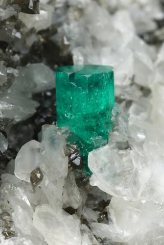 Beryl (variety emerald), Pyrite, Calcite, Dolomite<br />Coscuez mining district, Municipio San Pablo de Borbur, Western Emerald Belt, Boyacá Department, Colombia<br />75x86x58mm, xl=9x6mm<br /> (Author: Fiebre Verde)