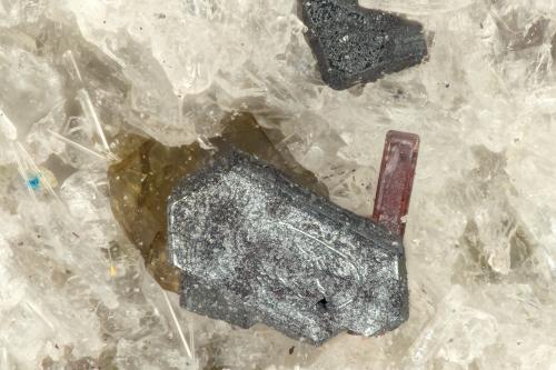 Pseudobrookite, Ilmenite, Cuprorivaite<br />Summit Rock, Klamath County, Oregon, USA<br />FOV = 1.2 mm<br /> (Author: Doug)