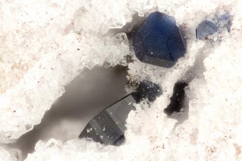 Osumilite<br />Obsidian Cliffs, North Sister Mountain, McKenzie Pass, Lane County, Oregon, USA<br />FOV = 1.4 mm<br /> (Author: Doug)