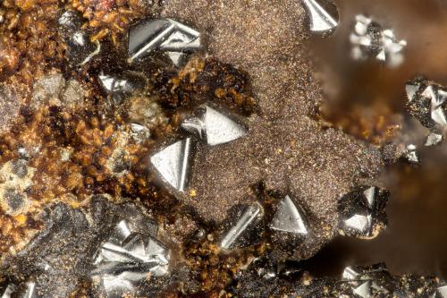 Hetaerolite<br />Mohawk Mine, Mohawk Hill, Clark Mountains, Clark Mountain District (Clark District), San Bernardino County, California, USA<br />FOV = 1.7 mm<br /> (Author: Doug)