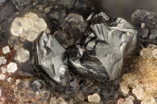 Hetaerolite<br />Mohawk Mine, Mohawk Hill, Clark Mountains, Clark Mountain District (Clark District), San Bernardino County, California, USA<br />FOV = 1.3 mm<br /> (Author: Doug)