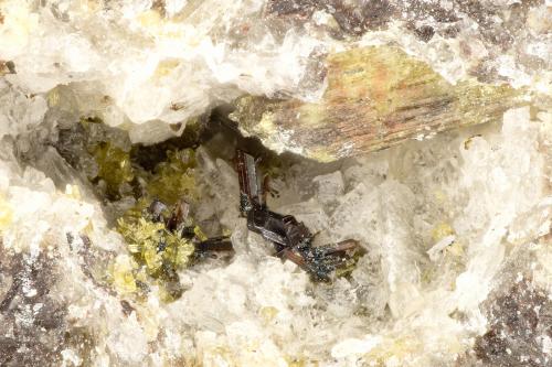 Pseudobrookite<br />Summit Rock, Klamath County, Oregon, USA<br />FOV = 2.3 mm<br /> (Author: Doug)