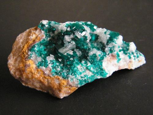 Dioptase and Calcite<br />Tsumeb Mine, Tsumeb, Otjikoto Region, Namibia<br />54mm x 36mm x 16mm<br /> (Author: Heimo Hellwig)