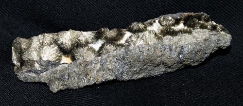 Millerite<br />Thompson Mine (Thompson open pit), Thompson, Winnipeg Capital Region, Manitoba, Canada<br />9x2x2 cm<br /> (Author: Joseph DOliveira)