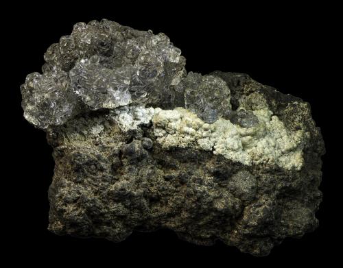 Opal-AN (variety hyalite) with Fluorapatite (variety staffelite)<br />Valeč, Doupov, Región Karlovy Vary, Bohemia, República Checa<br />75 x 48 x 55 mm<br /> (Author: Rob Schnerr)