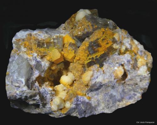 Fluorita y Barita.<br />Mina María Magdalena (Mina Santiago), Galeria de la Font del Metge, La Font del Metge, Ulldemolins, Comarca Priorat, Tarragona, Cataluña / Catalunya, España<br />50x35 mm.<br /> (Autor: Jesus Franquesa Baucells)