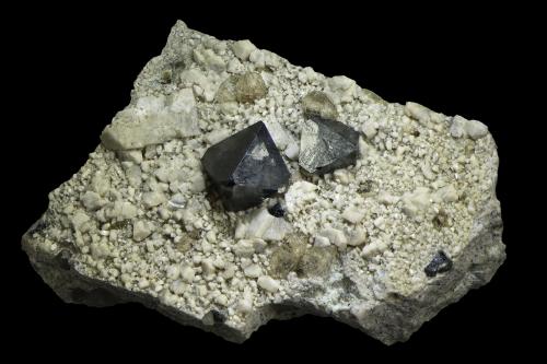Magnetite<br />Huayriquiña mine (Huaraniquiña mine), Cerro Huañaquino, Paco Grande, Tomás Frías Province, Potosí Department, Bolivia<br />45 x 30 x 21 mm<br /> (Author: Rob Schnerr)