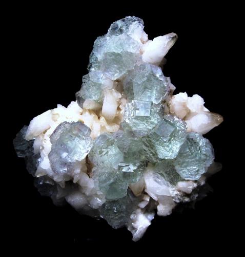 Fluorite on calcite<br />Shangbao Mine, Leiyang, Hengyang Prefecture, Hunan Province, China<br />Specimen size 10,5 cm, largest fluorite crystals 2 cm<br /> (Author: Tobi)