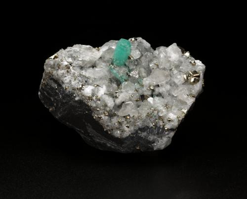 Beryl (variety emerald), Calcite, Pyrite<br />Muzo mining district, Western Emerald Belt, Boyacá Department, Colombia<br />64x44x56mm, xl=12x5mm<br /> (Author: Fiebre Verde)