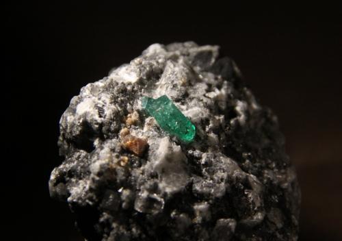 Beryl (variety emerald), Parisite and Calcite<br />Muzo mining district, Western Emerald Belt, Boyacá Department, Colombia<br />45mm x 42mm x 36mm<br /> (Author: Firmo Espinar)