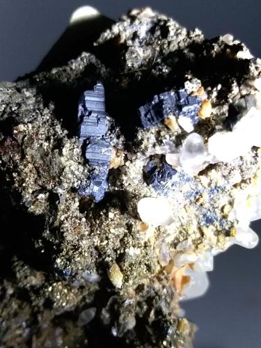 Bournonite, Pyrite, Calcite, Siderite<br />Brosso Mine, Cálea, Léssolo, Canavese District, Metropolitan City of Turin Province, Piedmont (Piemonte), Italy<br />62 x 49 mm<br /> (Author: Sante Celiberti)