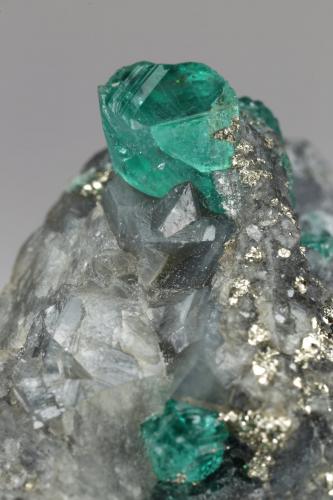 Beryl (variety emerald), Pyrite, Calcite<br />Chivor mining district, Municipio Chivor, Eastern Emerald Belt, Boyacá Department, Colombia<br />36mm x 45mm x 37mm, xls=13 & 5mm<br /> (Author: Fiebre Verde)