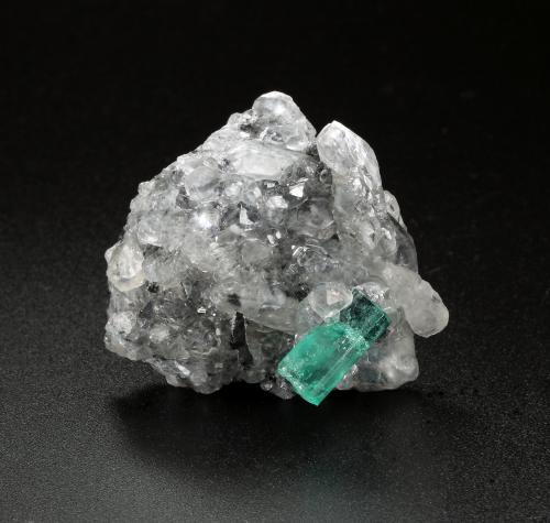 Beryl (variety emerald), Calcite<br />La Pita mining district, Polveros Mine, Municipio Maripí, Western Emerald Belt, Boyacá Department, Colombia<br />39mm x 32mm x 21mm, xl=12mm<br /> (Author: Fiebre Verde)