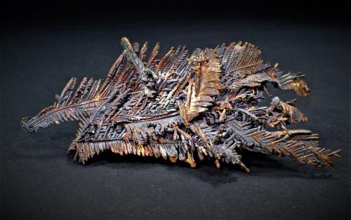 Copper, Cuprite<br />Itauz Mine, Dzhezkazgan, Karaganda Region, Kazakhstan<br />62 mm x 25 mm 16 mm<br /> (Author: Don Lum)