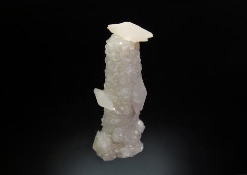 Calcite on quartz<br />Cavnic mining area, Cavnic, Maramures, Romania<br />2.2 cm x 5.7 cm.<br /> (Author: Michael Shaw)