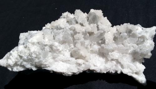 Calcite on Quartz variety smoky<br />Baimashan tunnel (construction site), Qianbaxia, Wuyishan, Nanping Prefecture, Fujian Province, China<br />11 x 6 cm<br /> (Author: Volkmar Stingl)