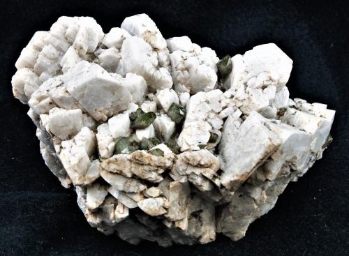 Titanite on Ilmenite pseudomorped by Rutile with Microcline<br />Imilchil area, Anti-Atlas, Er Rachidia Province, Drâa-Tafilalet Region, Morocco<br />10x6x5.5 cm<br /> (Author: Joseph DOliveira)
