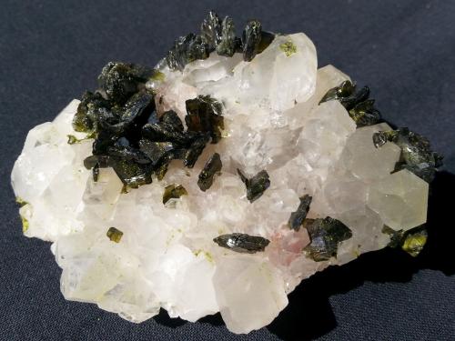 Epidote on Quartz<br />Meigu, Liangshan Autonomous Prefecture, Sichuan Province, China<br />8 x 5 cm<br /> (Author: Volkmar Stingl)