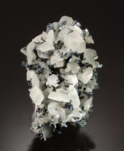 Calcite on Stibnite<br />Herja Mine, Chiuzbaia, Baia Sprie, Maramures, Romania<br />3.5 cm x 7.0 cm<br /> (Author: Michael Shaw)
