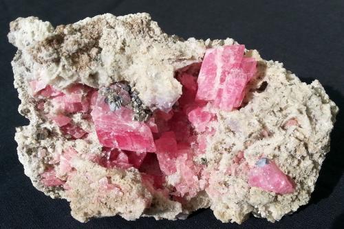 Rhodochrosite, Pyrite<br />Wutong Mine, Liubao, Cangwu, Wuzhou Prefecture, Guangxi Zhuang Autonomous Region, China<br />10 x 6 cm<br /> (Author: Volkmar Stingl)