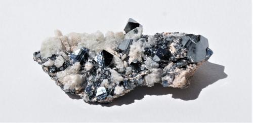Hematite and Calcite<br />N'Chwaning mining area, Kuruman, Kalahari manganese field (KMF), Northern Cape Province, South Africa<br />60mm  X 40mm X 20mm<br /> (Author: Philippe Durand)