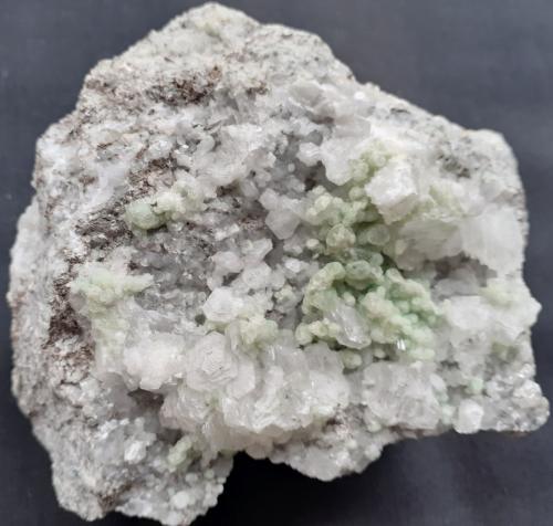 Fluorite, Calcite<br />Shangmei tunnel (construction site), Dongji, Chengsun, Wuyishan, Nanping Prefecture, Fujian Province, China<br />8 x 7 cm<br /> (Author: Volkmar Stingl)