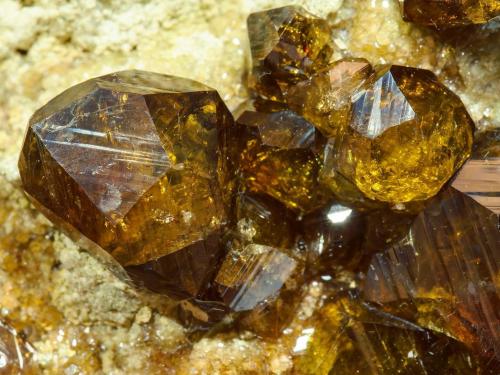 Andradite (variety topazolite)<br />Antetezambato outcrop, Antetezambato, Maherivaratra Commune, Ambanja District, Antsiranana Province, Madagascar<br />Crystal size: 1.6 × 1.2 cm<br /> (Author: Jordi Fabre)