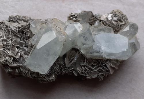 Beryl (variety Aquamarine), Muscovite<br />Mount Xuebaoding, Pingwu, Mianyang Prefecture, Sichuan Province, China<br />9,5 x 4,5 cm<br /> (Author: Volkmar Stingl)