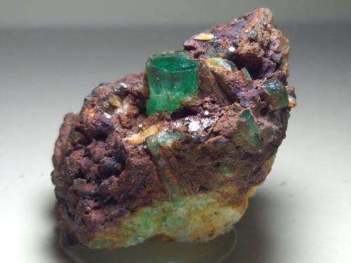 Beryl (variety emerald), Pyrite<br />Muzo mining district, Western Emerald Belt, Boyacá Department, Colombia<br />42 x 27 mm<br /> (Author: Sante Celiberti)
