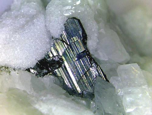 Sartorita<br />Cantera Lengenbach, Fäld, Valle Binn (Binntal), Wallis (Valais), Suiza<br />Cristales de 3 mm.<br /> (Autor: Antonio P. López)