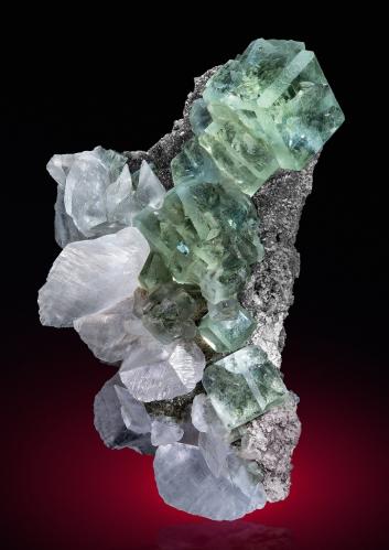 Fluorite, Calcite<br />Xianghualing Mine, Xianghualing Sn-polymetallic ore field, Linwu, Chenzhou Prefecture, Hunan Province, China<br />Specimen height 18 cm, largest fluorite 3,5 cm, largest calcite 5 cm<br /> (Author: Tobi)