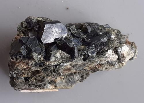 Augite (variety fassaite)<br />Toal de la Fassaita, Monzoni Mountains, Fassa Valley, Trento Province, Trentino-Alto Adige (Trentino-Südtirol), Italy<br />3 x 2,5 cm<br /> (Author: Volkmar Stingl)