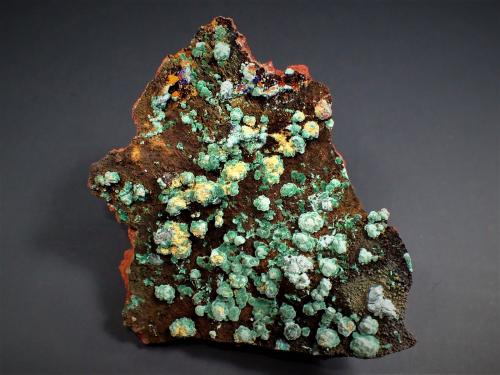 Malachite after Cuprite<br />Sounion Mine No. 12, Apo Sounio mines, Sounion area, Lavrion Mining District, Attikí (Attica) Prefecture, Greece<br />70 mm x 55 mm x 20 mm<br /> (Author: Don Lum)