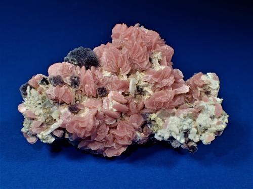 Rhodochrosite, Fluorite, Barite, Apatite<br />Wutong Mine, Liubao, Cangwu, Wuzhou Prefecture, Guangxi Zhuang Autonomous Region, China<br />78 mm x 54 mm x 37 mm<br /> (Author: Don Lum)