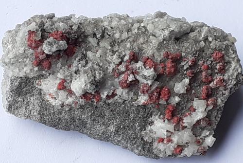 Cinnabar, Calcite<br />Le Solforate Mine, Amiata Mountain, Piancastagnaio, Siena Province, Tuscany, Italy<br />4 x 2,5 cm<br /> (Author: Volkmar Stingl)