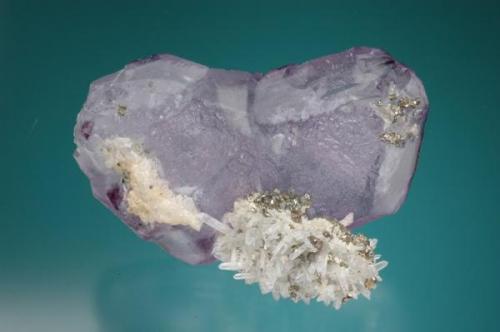 Fluorite, (spinel twin) included by pyrite and quartz. 
Yaogangxian Mine, Chenzhou, Hunan Province, China
6.1 x 3.0 x 4.4 cm (Author: Gail)