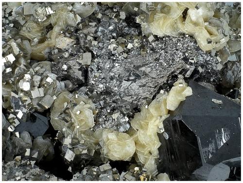 Cassiterite, Pyrite, Arsenopyrite, Siderite<br />Minas da Panasqueira, Aldeia de São Francisco de Assis, Covilhã, Castelo Branco, Cova da Beira, Centro, Portugal<br />6 cm x 4 cm x 4 cm<br /> (Author: silvia)