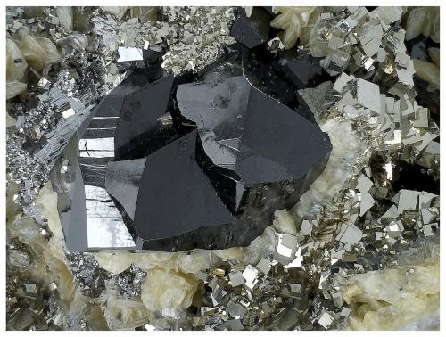 Cassiterite, Pyrite, Arsenopyrite, Siderite<br />Minas da Panasqueira, Aldeia de São Francisco de Assis, Covilhã, Castelo Branco, Cova da Beira, Centro, Portugal<br />6 cm x 4 cm x 4 cm<br /> (Author: silvia)