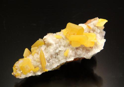 Wulfenite<br />Hilltop Mine, Rustler Park, California District, Chiricahua Mountains, Cochise County, Arizona, USA<br />4.5 x 2.0 x 1.5 cm<br /> (Author: Michael Shaw)